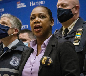 NYPD Commissioner Keechant Sewell, center, speaks during a news conference after the shooting of two NYPD officers, Jan. 21, 2022, in New York.