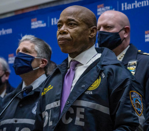 New York City Mayor Eric Adams, center, speaks during a news conference Jan. 21, 2022, in New York.