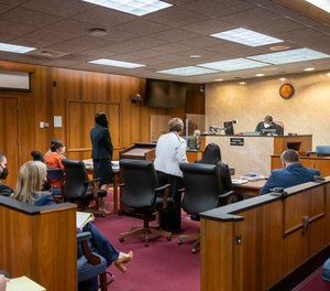 A placement hearing for E.C. at Oakland County circuit court in Pontiac, Mich., on Tuesday, Feb. 22, 2022, over the teen's placement as he awaits trial.