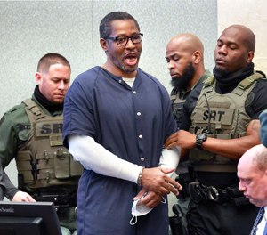 Markeith Loyd, convicted of killing Orlando police Lt. Debra Clayton in 2017, shouts at the gallery as deputies remove him from the courtroom after he was sentenced to death in Orange County circuit court in Orlando, Thursday, March 3, 2021.