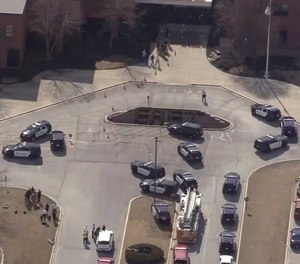 Emergency personnel respond to the scene of a shooting at Olathe East High School on Friday, March 4, 2022 in Olathe, Kansas.