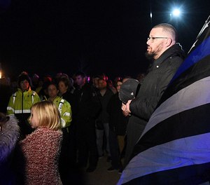 Hundreds of emergency personnel and community members gather Tuesday, March 8, 2022 at a vigil at Cunningham Park in Joplin, Mo.
