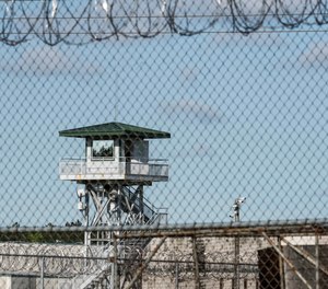 In this April 16, 2018, photo, a guard tower stands above the Lee Correctional Institution, a maximum security prison in Bishopville, S.C.