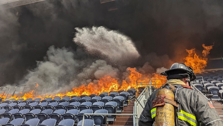 Firefighters extinguished a blaze that torched several rows of seats and a suite area at the Denver Broncos' stadium on March 24. 