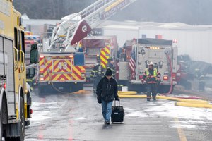 Dane Groszek, of Middletown N.Y., made his way off of Interstate 81 after his car was totaled in a multi-vehicle crash Monday along Interstate 81. Groszek was on his way home after visiting family in Daytona, Fla.