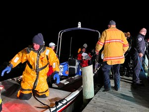 First responders took part in a rescue operation after a U.S. Navy E2-D Hawkeye aircraft crashed Wednesday in waters near the Eastern Shore boundary of Virginia and Maryland, near Stockton, Md.