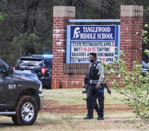 Law enforcement respond to a shooting at Tanglewood Middle School in Greenville, S.C., Thursday March 31, 2022. A student was shot and taken to the hospital Thursday at the South Carolina middle school, authorities said. The shooter, a minor, was taken into custody near Tanglewood Middle School not long after the shooting, Greenville County Sheriff’s Lt. Ryan Flood said in a statement.