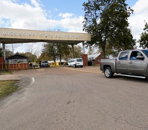 The front gate of the Mississippi State Penitentiary in Parchman, Miss., is shown Nov. 17, 2021.