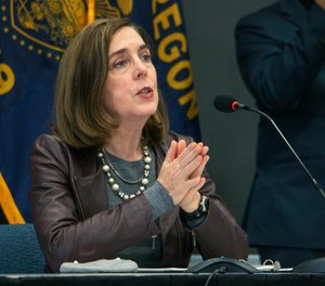 Oregon Gov. Kate Brown speaks on Nov. 10, 2020, in Portland, Ore.