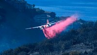 U.S. testing new fire retardant, but critics push other methods such as hiring more firefighters