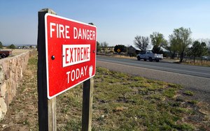 A fire warning sign is pictured in Las Vegas, N.M., on Tuesday.