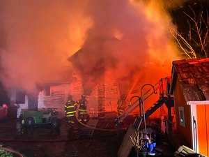 Sparta Area Fire District Chief Mike Arnold said crews responded shortly after 9 p.m. Thursday to a report of a house fire with people trapped upstairs.