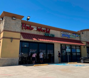 Police on Tuesday arrested a man who opened fire last week inside a hair salon in Dallas' Koreatown area, wounding three people. Police are investigating the shooting as a possible hate crime.