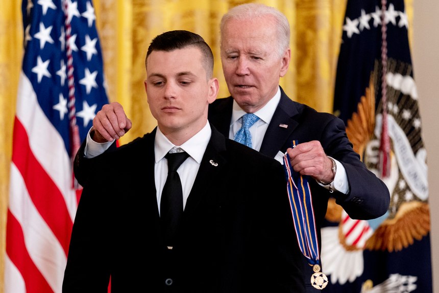 President Joe Biden awards Dalton "Storm" Rushing, with Perry County, Ohio Sheriff's office the Public Safety Officer Medal of Valor.