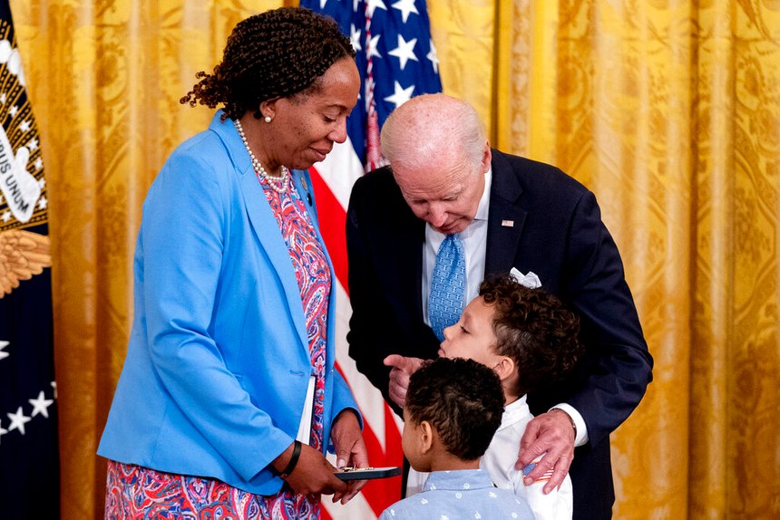 Sabrail Davenport, mother of fallen Spring Valley, N.Y., Fire Department 2nd Lieutenant Jared Lloyd, accepts the Public Safety Officer Medal of Valor by President Joe Biden on behalf of her late son on Monday.