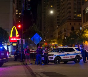 Two people were killed and another eight were wounded in a shooting near a fast food restaurant Thursday, May 19, 2022 in Chicago.
