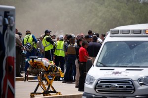 Emergency personnel gather near Robb Elementary School following a shooting, Tuesday, May 24, 2022, in Uvalde, Texas.