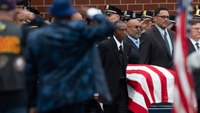 Retired officer killed in Buffalo supermarket attack honored at funeral