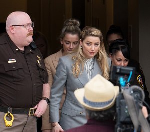 Actress Amber Heard departs the Fairfax County Courthouse Friday, May 27, 2022 in Fairfax, Va. A jury heard closing arguments in Johnny Depp's high-profile libel lawsuit against ex-wife Amber Heard.