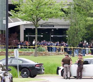 Emergency personnel respond to a shooting at the Natalie Medical Building Wednesday, June 1, 2022. in Tulsa, Okla.