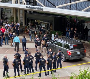 Emergency personnel respond to a shooting at the Natalie Medical Building Wednesday, June 1, 2022. in Tulsa, Okla. Multiple people were shot at a Tulsa medical building on a hospital campus Wednesday.