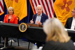 President Joe Biden (center) spoke during a briefing on the New Mexico wildfires with New Mexico Gov. Michelle Lujan Grisham (left) and David Dye, New Mexico secretary of homeland security and emergency management, at the New Mexico State Emergency Operations Center on Saturday in Santa Fe, N.M.