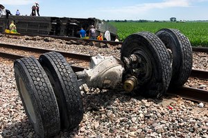 In this photo provided by train passenger Dax McDonald, debris sits near railroad tracks after an Amtrak passenger train derailed near Mendon, Mo., on Monday. The Southwest Chief, traveling from Los Angeles to Chicago, was carrying about 243 passengers when it collided with a dump truck near Mendon, Amtrak spokeswoman Kimberly Woods said.