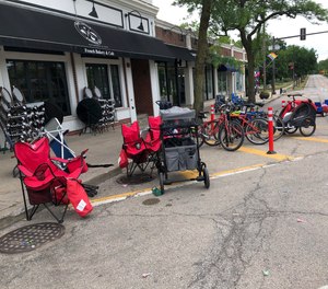 Terrified parade-goers fled Highland Park's Fourth of July parade after shots were fired, leaving behind their belongings as they sought safety, Monday, July 4, 2022, in Highland Park, Ill.