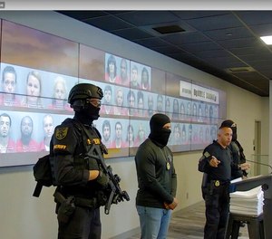 In this image taken from an undated video posted by the Lee County, Fla., Sheriff's Office, Sheriff Carmine Marceno speaks at a news conference in Fort Myers, Fla. Sheriff Marceno refers to the jailhouse as the