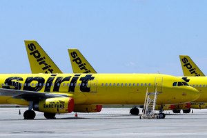 Spirit Airlines jets sit on the tarmac at the Orlando International Airport in 2020. On Wednesday, a fire broke out on a Spirit Airlines flight from Dallas to Orlando.