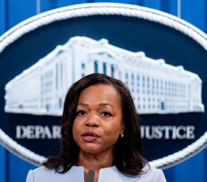 Assistant Attorney General for Civil Rights Kristen Clarke speaks at a news conference at the Department of Justice in Washington, on Aug. 5, 2021. The U.S. Justice Department has opened an investigation into the Maryland State Police to determine if the agency engaged in racially discriminatory hiring and promotion practices, federal prosecutors announced Friday, July 15, 2022.