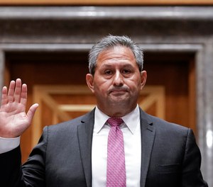 Michael Carvajal, director of the Federal Bureau of Prisons, is sworn in to testify as the Senate Permanent Subcommittee On Investigations holds a hearing on charges of corruption and misconduct at the U.S. Penitentiary in Atlanta, at the Capitol in Washington, Tuesday, July 26, 2022. (AP Photo/J. Scott Applewhite)