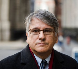 Dr. Ricardo Cruciani walks from the center for criminal justice, Tuesday, Nov. 21, 2017, in Philadelphia, after pleading guilty to misdemeanor charges that he groped women at a clinic. The once-prominent neurologist has been found guilty Friday, July 29, 2022, in New York, on charges of sexually abusing patients while treating them with pain medications. (AP Photo/Matt Rourke, File)