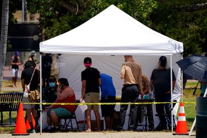 People lined up at a monkeypox vaccination site on Thursday in Encino, Calif. California's governor declared a state of emergency over monkeypox on Monday.