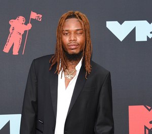 Fetty Wap appears at the MTV Video Music Awards in Newark, N.J. on Aug. 26, 2019. Fetty Wap, whose real name is Willie Maxwell, has been jailed after prosecutors say he threatened to kill a man during a FaceTime call in 2021, violating the terms of his pretrial release in a pending federal drug conspiracy case. U.S. Magistrate Judge Steven Locke, acting on a request from prosecutors, revoked Maxwell’s bond and sent him to jail following a hearing in federal court on Long Island. (Photo by Evan Agostini/Invision/AP, File)