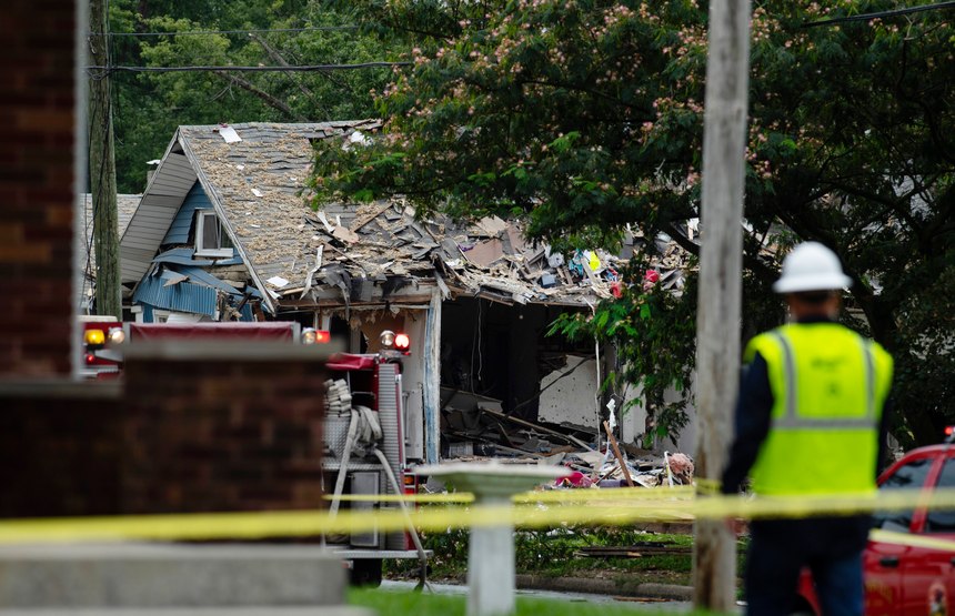 Emergency crews respond to a house explosion on North Weinbach Avenue in Evansville, Ind., Wednesday afternoon, Aug. 10, 2022. Several people were killed Wednesday when a house exploded in the southern Indiana city of Evansville, authorities said.