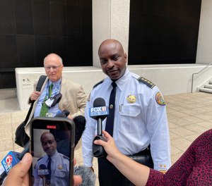 New Orleans Police Superintendent Shaun Ferguson talks to reporters outside the federal courthouse in New Orleans.