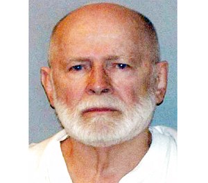 This June 23, 2011, file booking photo provided by the U.S. Marshals Service shows James