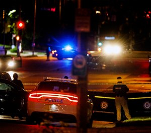 Memphis Police officers work an active shooter scene on Poplar Avenue in Memphis, Tenn.
