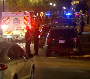 Police and emergency personnel respond the scene of an explosion in Boston, Tuesday, Sept. 13, 2022. A package exploded on the campus of Northeastern University and the college said a staff member suffered minor injuries.
