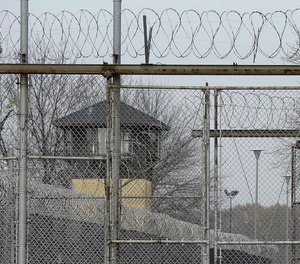 Security fences surround the Illinois Department of Corrections' Logan Correctional Center.