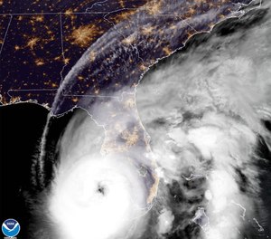 This satellite image provided by NOAA shows Hurricane Ian off Florida's southwest coast Wednesday, Sept. 28, 2022.