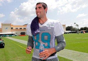 Gavin Escobar, a Miami Dolphins tight end at the time, walked off the field at the NFL team's training camp on July 26, 2018, in Davie, Fla. Two rock climbers, including the former NFL player who became a firefighter, were found dead dear a Southern California peak after rescue crews responded to reports of injuries, authorities said Wednesday.