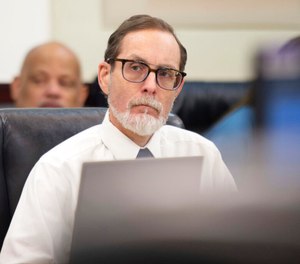 Alexander Friedmann listens during the first day of his trial at the Justice A.A. Birch Building in Nashville, Tenn., July 19, 2022. Friedmann, a longtime prison reform advocate, was sentenced to 40 years behind bars on Thursday, Oct. 6, 2022, following his conviction for hiding guns, ammunition, handcuff keys and hacksaw blades inside the walls of Nashville's new jail while it was being built. (Stephanie Amador/The Tennessean via AP, File)