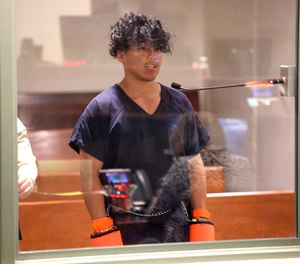 Las Vegas Strip stabbing spree suspect Yoni Barrios makes his initial court appearance at the Regional Justice Center in Las Vegas, Friday, Oct. 7, 2022. Barrios will be charged with murder, the region's top prosecutor said Friday.