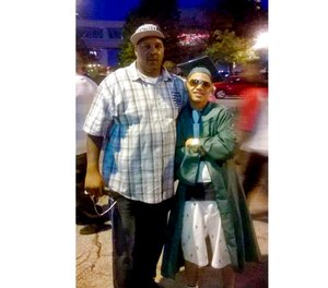 This undated photo taken by Kimberly Perry shows Terrill Thomas, left, and his son Terrill Barnes. The company that provided medical services at jail in Wisconsin has been found guilty Tuesday, Oct. 11, 2022, in the dehydration death of Thomas in 2016. Armor Correctional Health Services Inc., based in Miami, Florida, was charged in 2018 with a felony and seven misdemeanors after its employees were accused of neglecting to check on Thomas during his week in isolation at the Milwaukee County Jail.