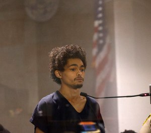 Tyson Hampton, who is accused of killing Las Vegas police officer Truong Thai, appears in court for his initial hearing, Friday, Oct. 14, 2022, at the Regional Justice Center in Las Vegas.