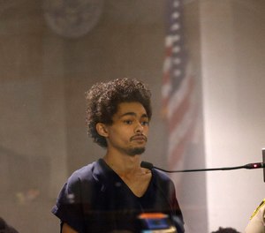 Tyson Hampton, who is accused of killing Las Vegas police officer Truong Thai, appears in court for his initial hearing, Friday, Oct. 14, 2022, at the Regional Justice Center in Las Vegas.