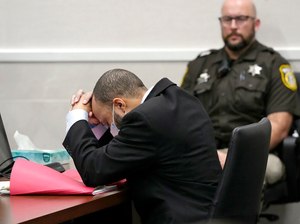 Darrell Brooks reacts as the guilty verdict is read during his trial in a Waukesha County Circuit Court in Waukesha, Wis., on Wednesday, Oct. 26, 2022. Brooks represented himself during the trial and was charged with driving into a Waukesha Christmas Parade last year, killing six people and injuring dozens more. Brooks was found guilty Wednesday of all 76 charges, including six counts of first-degree intentional homicide.