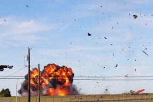 A historic military plane crashes after colliding with another plane during an airshow at Dallas Executive Airport on Saturday. Everyone on the planes was killed.